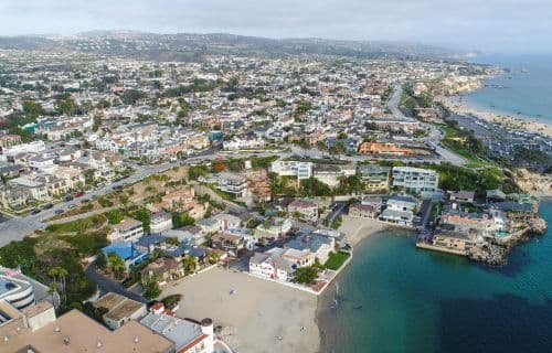 Orange County coastline Aerial view of the Orange County coast, with homes, a beach, and the ocean